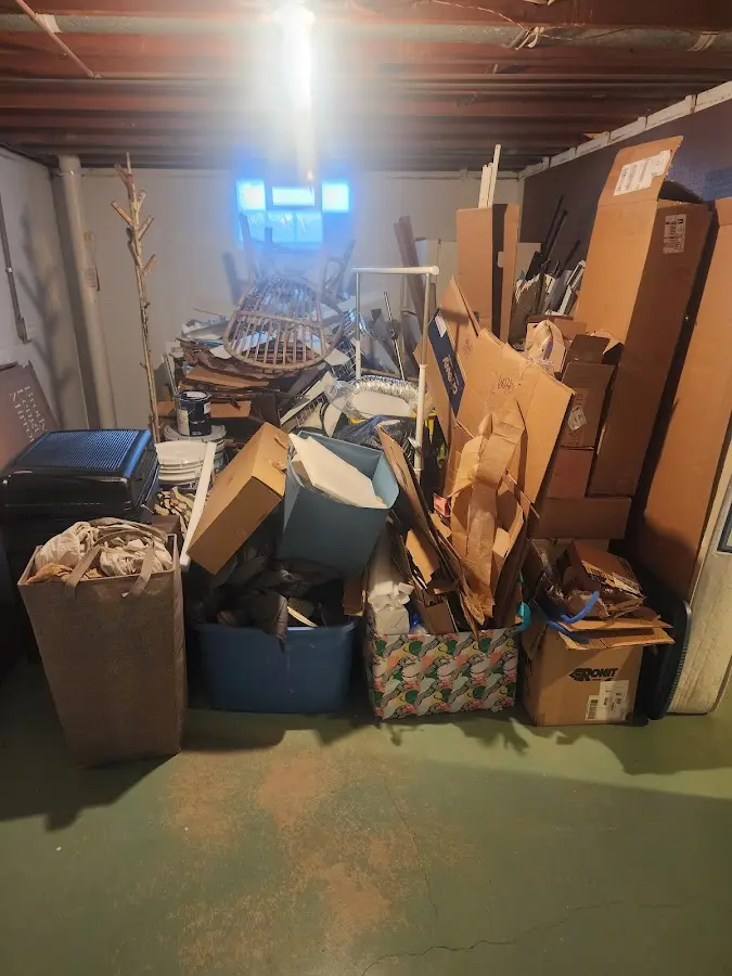 Roll-off dumpster container at job site for 4 Yard Dumpster Rental in Walker